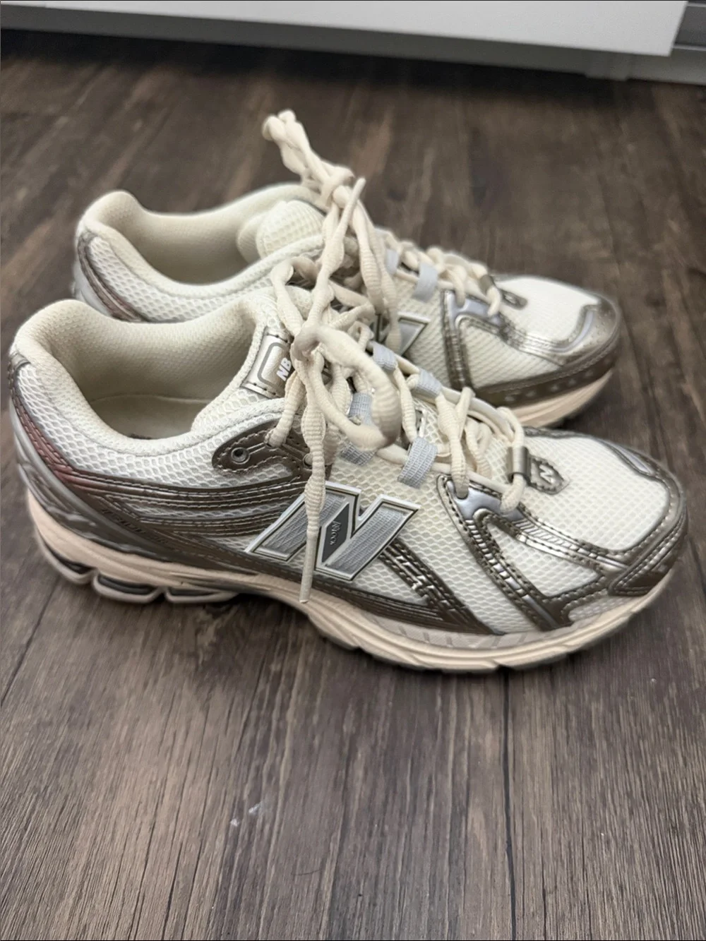 New Balance Women’s Cream and Metallic Silver Athletic Sneakers 1906